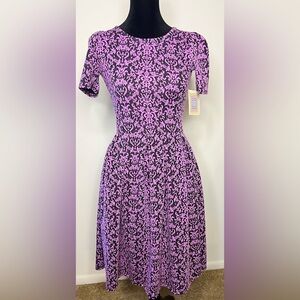 NWT LulaRoe Amelia dress in XXS, size 0-2. Pleated skirt bottom, pockets.